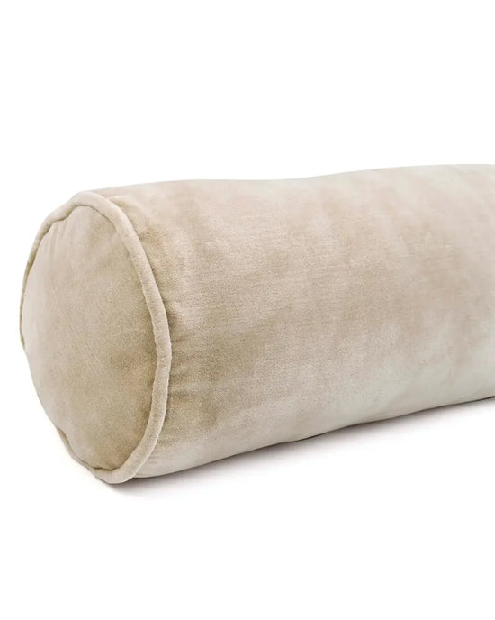 The Casa Amarosa Velvet Bolster Pillow in Biscotti features a soft cotton velvet cover and a cylindrical design, shown on a white background—an elegant, stylish decorative accent for any room.