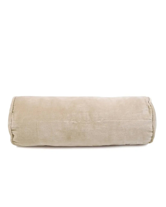 The Velvet Bolster Pillow in Biscotti by Casa Amarosa is displayed against a white background, offering a cozy and stylish decorative accent.