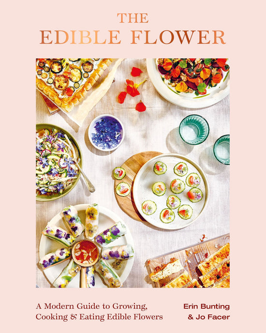 Cover of Edible Flower by Chronicle Books, an organic cookbook showcasing seasonal recipes with vibrant edible flower garnishes, arranged on a light table. Authors and subtitle emphasize its colorful, fresh presentation.