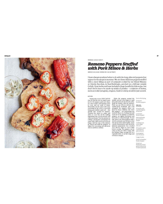 Overhead view of sliced romano peppers stuffed with pork mince and herbs on a wooden board, next to a page from Recipes from Sicily by Chronicle Books showing ingredients and instructions.