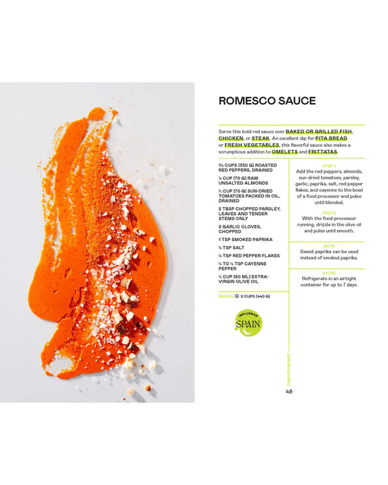 A smear of orange romesco from Saucy by Chronicle Books is artfully spread on white, topped with crumbled bread and slivered almonds—an inspiring sauce idea for everyday cooking. Recipe text appears to the right.