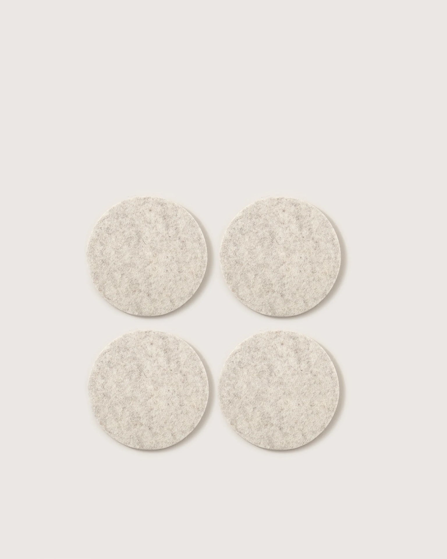 Bierfilzl Merino Wool Felt Round Coaster Solid in Heather White - 4 Pack