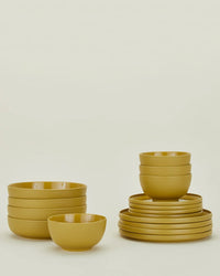 Hawkins New York Essential Dinnerware in Mustard - 16 Piece Set 