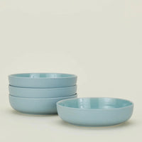 Hawkins New York Essential Dinnerware in Sky - 16 Piece Set 