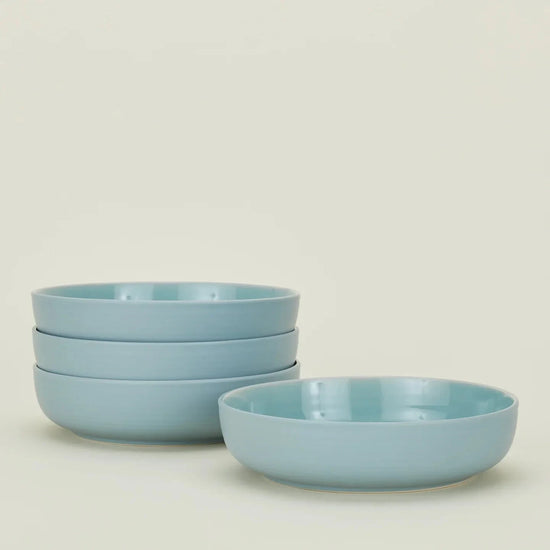 Hawkins New York Essential Dinnerware in Sky - 16 Piece Set 