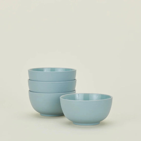 Hawkins New York Essential Dinnerware in Sky - 16 Piece Set 
