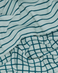 The Essential Dish Towels in Sky/Peacock by Hawkins New York feature light blue cotton with dark teal wavy and grid patterns—stylish, folded, and perfect for your kitchen. Set of 2.