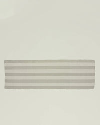 The Hawkins New York Essential Floor Runner in Light Grey is a rectangular, recycled-fiber hallway rug with horizontal gray and white stripes, shown against a plain white background.