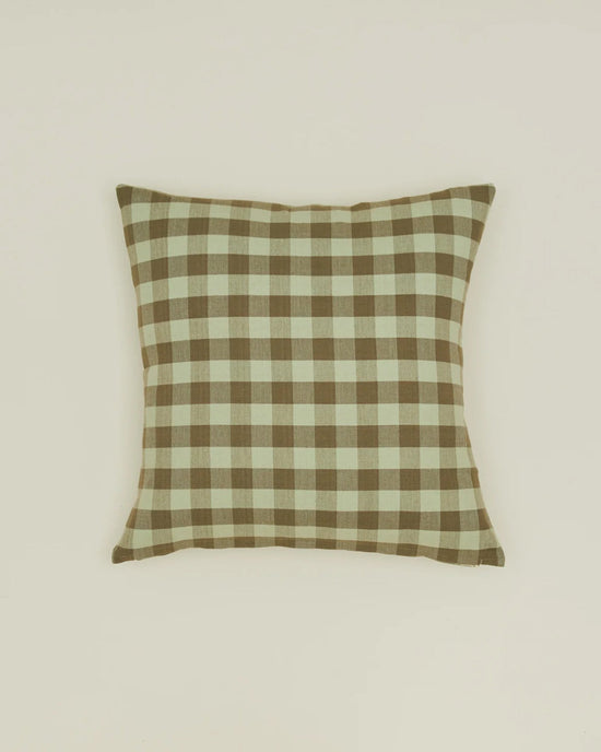The Hawkins New York Essential Gingham Pillow, 18x18 inches in Sage/Olive, features a classic check pattern and offers stylish European linen durability, shown against a plain off-white background.
