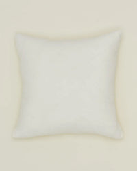 A Hawkins New York Simple Linen Pillow, 22x22 inches in ivory, with smooth European linen fabric, centered on a plain light beige background.
