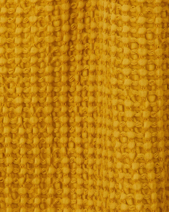 Hawkins New York Simple Waffle Shower Curtain in Mustard 