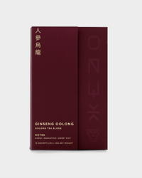 A maroon box of Onyx Coffee Lab’s Ginseng Oolong Tea | 12 Sachets, featuring gold and white text with flavor notes of maple, osmanthus, and sweet mint, containing Fujian oolong tea sachets.