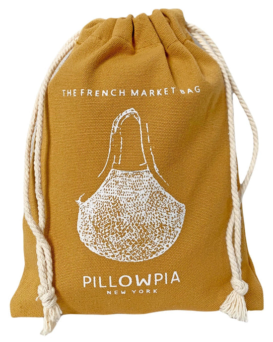 The French Market Bag No.2 in Goldenrod by PILLOWPIA is a mustard yellow reusable shopping bag with white rope handles, featuring a market bag graphic and the text The French Market Bag, Pillowpia New York.