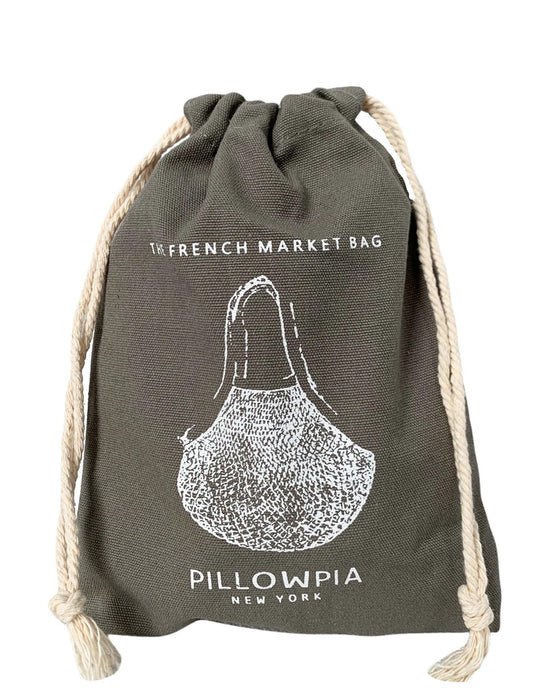 The French Market Bag No.2 in Iron by PILLOWPIA is an organic cotton gray drawstring bag with white rope handles, featuring a pear illustration and the text The French Market Bag and PILLOWPIA New York on the front.