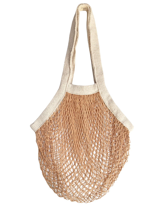 The French Market Bag No.2 in Wheat by PILLOWPIA—an eco-friendly, reusable beige organic cotton bag with sturdy handles—evokes the classic French Market Bag, shown against a white background.