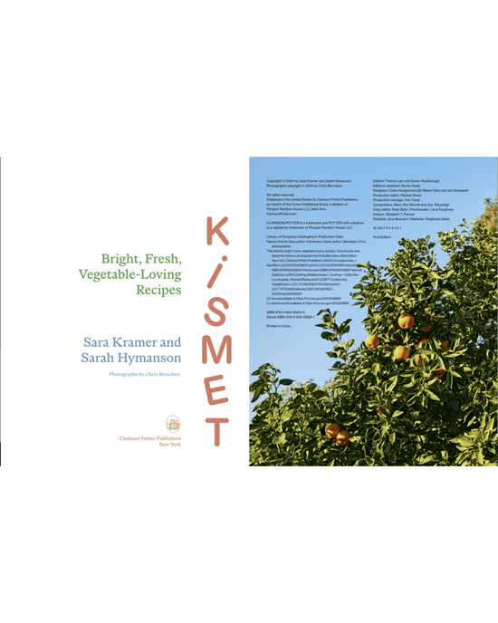 The left page displays the title Kismet by Random House; the right page features an orange tree with fruit set against a blue sky, evoking fresh, Mediterranean-inspired flavors.