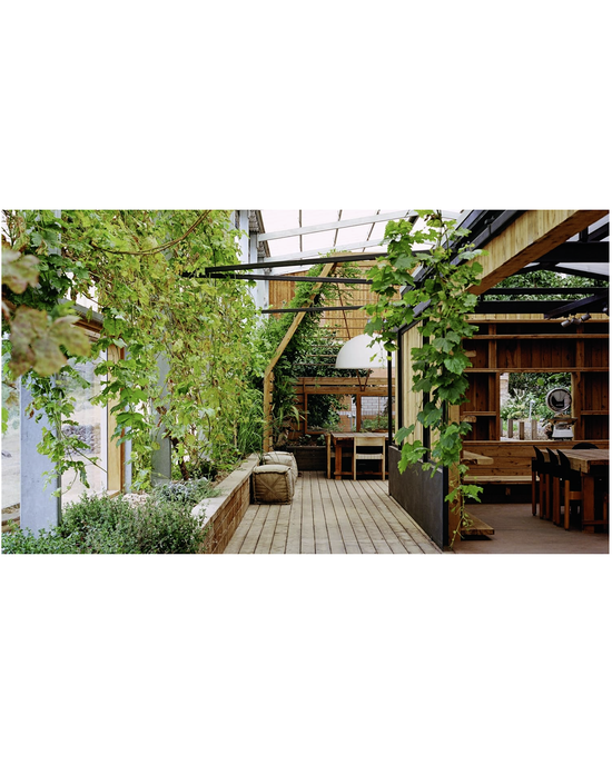 Transform your home with Outside In by Random House—featuring wooden flooring, trellised vines, and open patio shelving to seamlessly blend indoor comfort with outdoor charm.