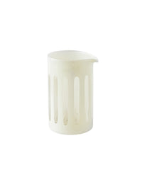 The SIR / MADAM Empire Mixer Powder is a white ceramic pitcher with a small spout and vertical slot cutouts, ideal for pouring craft cocktails, shown against a plain white background.