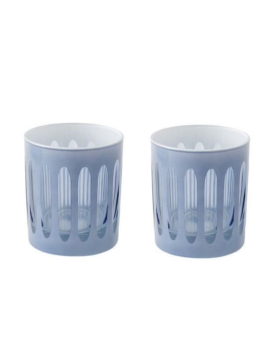 Two SIR / MADAM Empire Rocks Glacier glasses (set of 2) with translucent light blue finish, vertical oval cutouts, and a hand-finished touch are placed side by side on a white background.