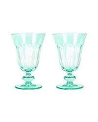 The SIR / MADAM Rialto Glass Tulip Menthe Set/2 features two hand-finished, green-tinted goblets with flared bowls and decorative stems, displayed side by side on a white background to highlight their elegance.