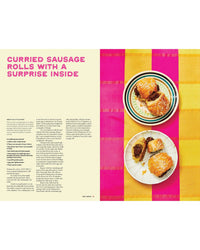 A magazine spread for Chronicle Books' "Hot Date!" shows a Middle Eastern-inspired Curried Sausage Rolls recipe on the left and sesame-topped sausage rolls on a pink and orange checked tablecloth on the right.