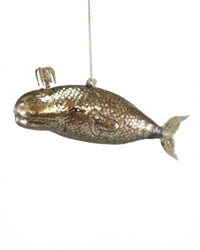 The Cody Foster Victorian Whale is a metallic gold glass ornament featuring a small spout and silver string, shown against a plain white background—an ideal hand-crafted decoration for any festive setting.
