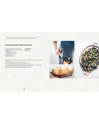 A person cooks Simon & Schuster Mussels over a flaming pan, with cooked mussels in a serving dish and a white wine butter sauce recipe from Sergio Herman’s cookbook visible.