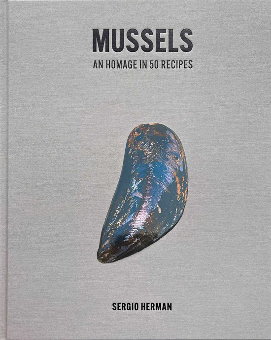 The cookbook Mussels by Simon & Schuster features a single mussel shell on a simple grey cover—ideal for those seeking creative ways to cook mussels.