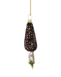 The Cody Foster Morel Mushroom - Tall Ornament is a hand-crafted glass decoration with black and brown detailing, a green base accent, and hangs from a gold string. Its shiny finish makes it a charming holiday ornament.