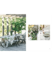 The Outdoor Chic table set by Cozy Publishing features chairs, a white tablecloth, and a wildflower vase on a wooden deck under a pergola; close-ups of wildflowers and a bowl with spoons are shown on the right.
